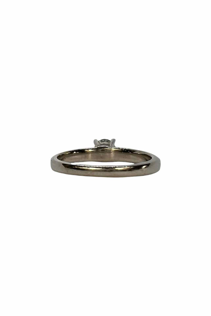 Peoples Size 5 14kt white gold solitare Ring
