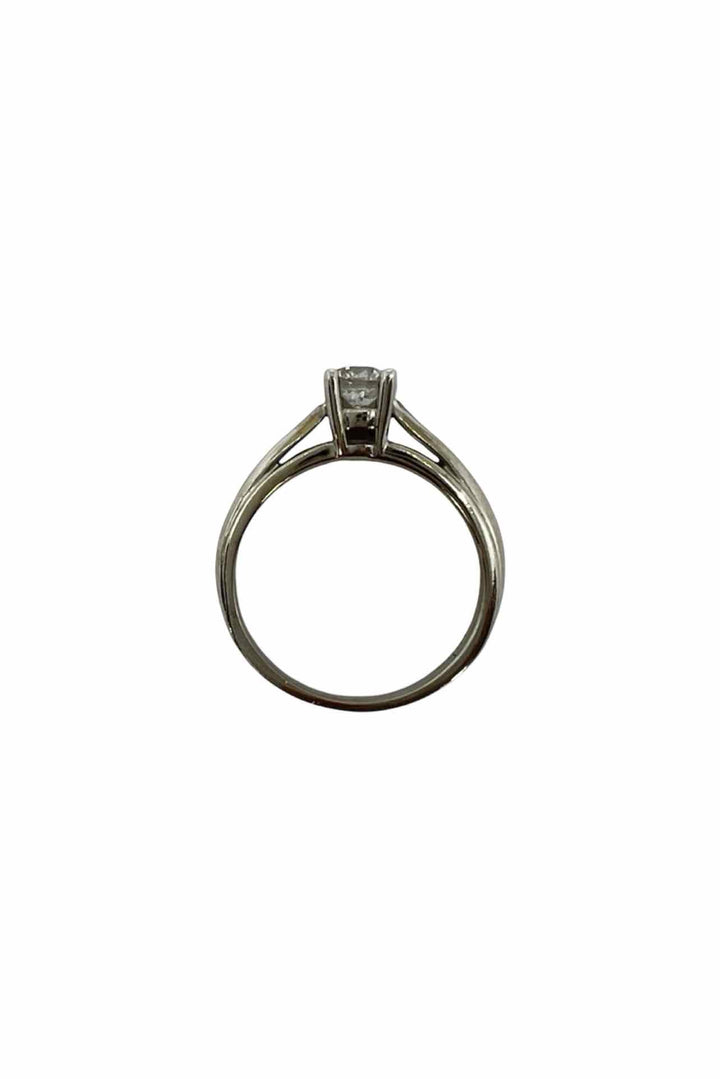 Peoples Size 5 14kt white gold solitare Ring