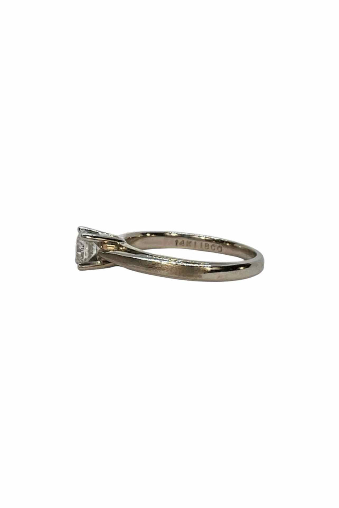 Peoples Size 5 14kt white gold solitare Ring